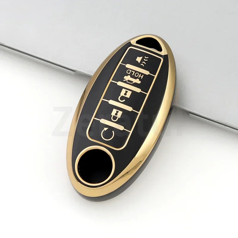 A gold-colored TPU car key case cover with a slot and multiple key holes is shown against a white background.