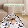A baby multi-functional fitness game stand with hanging toys on a mat for imagination and creativity.