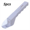 Five pieces of a white handheld insect catcher clamp tool with a pointed tip and a thin rod.