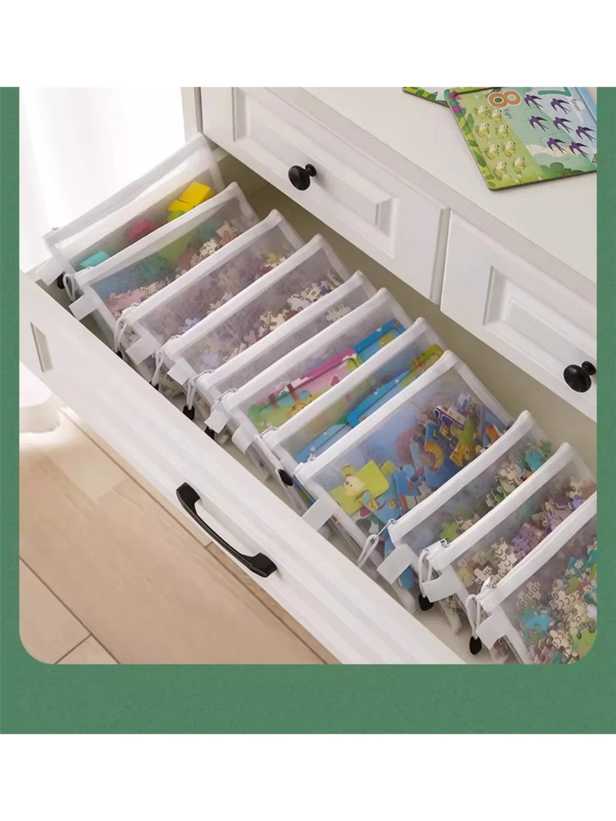 A set of eight transparent mesh zipper pouches in various sizes stored in a white cabinet drawer.