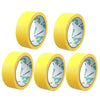 Cuatro rollos amarillos de cinta de enmascarar profesional y herramienta de corte.
