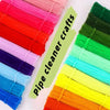 A collection of 100-piece pipe cleaners in various bright colors, arranged diagonally on a white background.