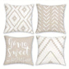 A set of four decorative pillowcases featuring a geometric pattern in beige and white tones.