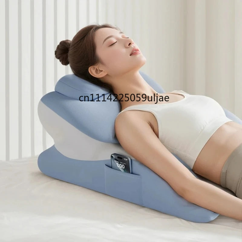 A woman is resting her eyes on a memory foam full-body support pillow while lying down.