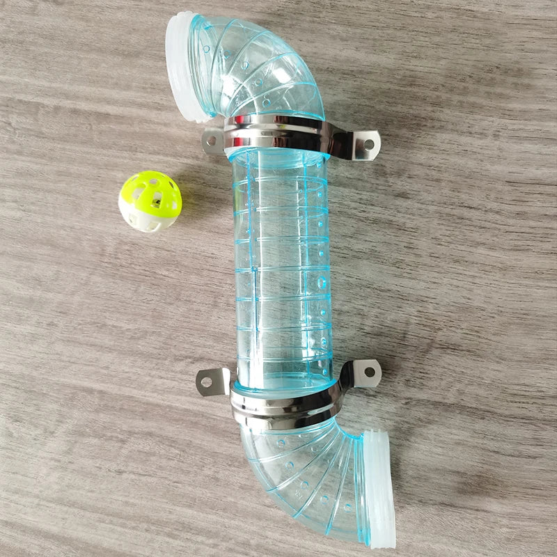 A clear plastic Montessori busy board accessory kit with a curved tube and fittings is shown on a wooden surface.