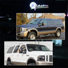 A side view of a dark blue Ford Excursion truck with amber LED mirror turn signal lights installed.