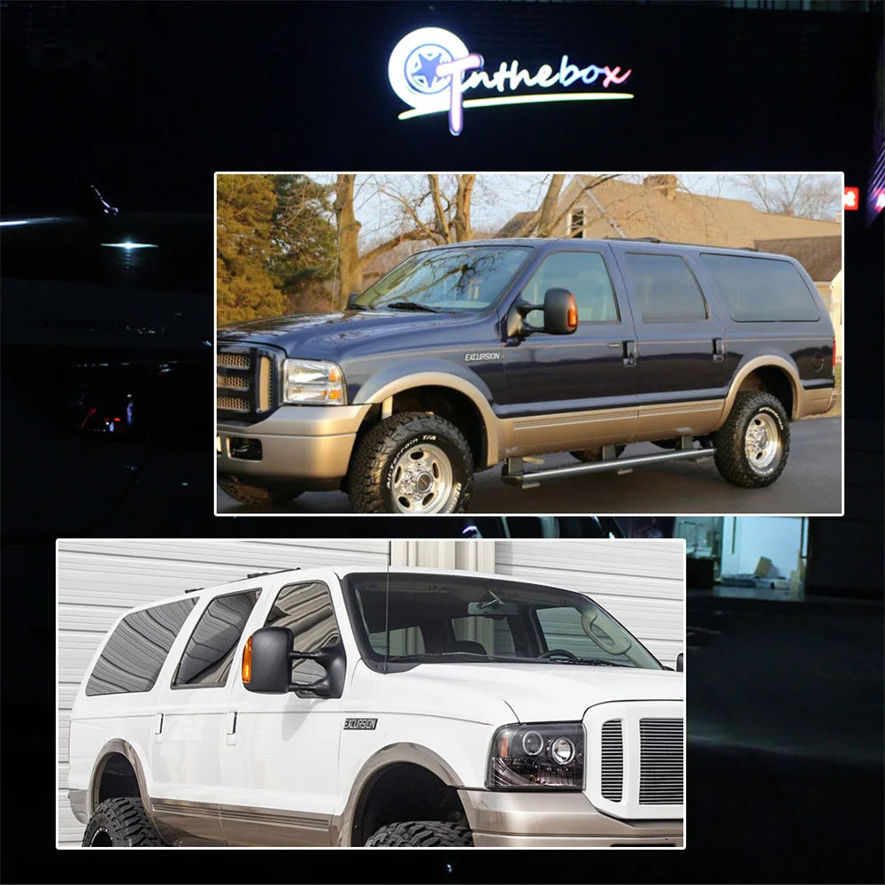 A side view of a dark blue Ford Excursion truck with amber LED mirror turn signal lights installed.