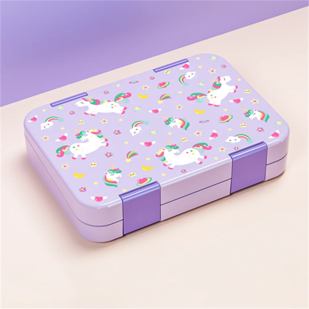 A purple portable kids lunch box with divided compartments decorated with colorful unicorns and hearts.
