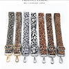 A collection of leopard print wide adjustable crossbody bag straps in various shades and patterns.