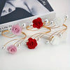 Elegant rose pattern curtain tiebacks featuring red and pink roses with pearl accents.