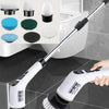 A white and black LED smart display electric spin scrubber with interchangeable brush heads is shown cleaning a floor.
