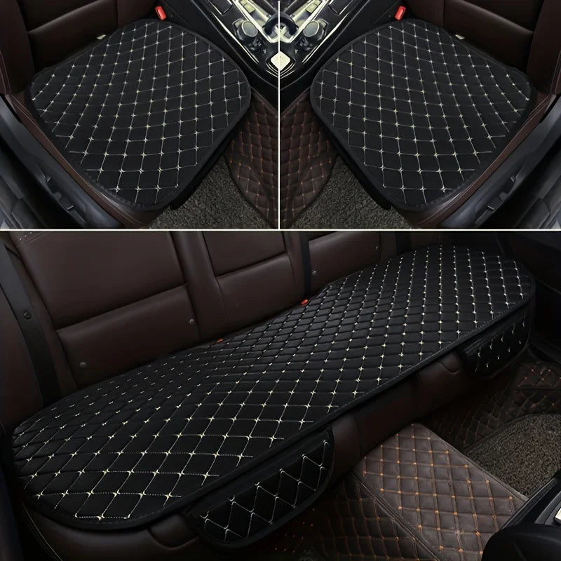A set of three black quilted car seat covers for universal protection, shown in a dark interior setting.