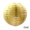 A round, crinkled gold paper lantern.