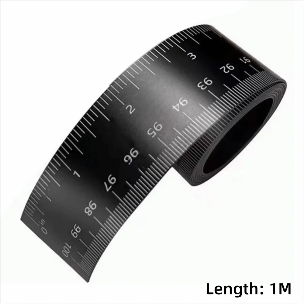 A black magnetic flexible measuring ruler showing a scale marked in inches and centimeters.