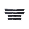 A set of four black PU leather door sill protector stickers for a Ford F-150