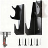 A pair of black heavy-duty floor jack stands with wall mount racks are shown against a white background.