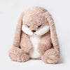 A fluffy, light brown rabbit plush toy with long ears and an angry expression.