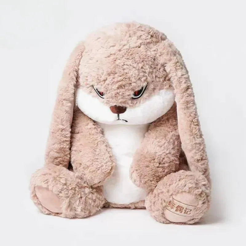 A fluffy, light brown rabbit plush toy with long ears and an angry expression.