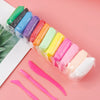 A collection of 36 colored clay tools and modeling items packaged in a clear plastic bag on a pink background.