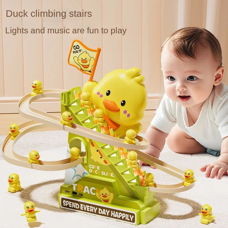 A baby is playing with a yellow duck climbing stairs toy that features lights and music.