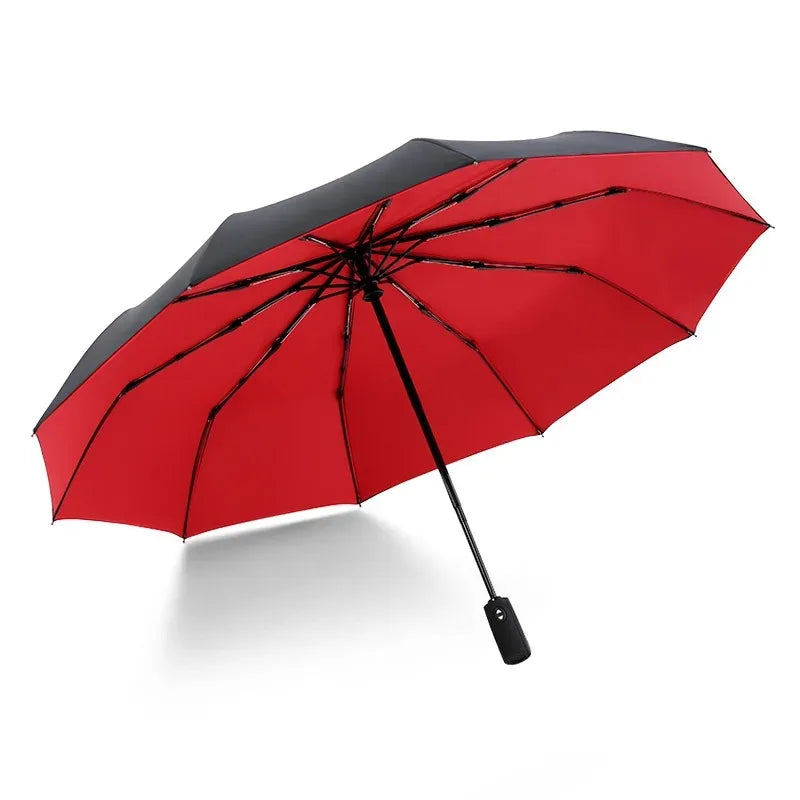 A red and black double-layer windproof umbrella open to show its canopy.