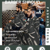 Superior quality barber shroud or waterproof hair cutting cape shown in use by a barber