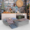 A stack of blue and gold marble self-adhesive wall stickers displayed in front of a rustic kitchen background.