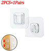 Two pairs of transparent adhesive wall hooks are shown, with an inset image demonstrating their installation.