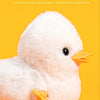 A white jade fox velvet surface wind-up walking chicken toy with yellow feet.