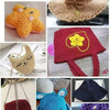 A collection of handmade crochet items including a yellow bear, a red hat with a yellow flower, and various knitted or croche