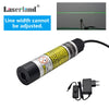 A long, cylindrical green laser module with an input port and output cable is shown against a gray background.