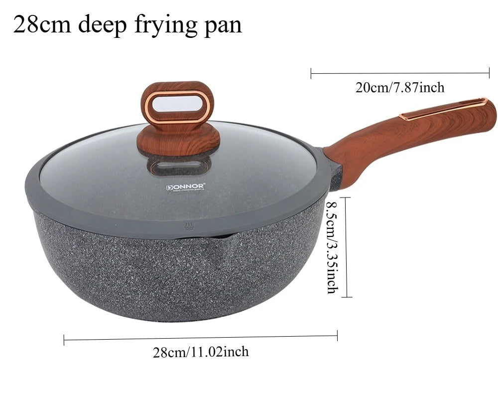 A black ceramic nonstick frying pan with a wooden handle and lid, shown from above.