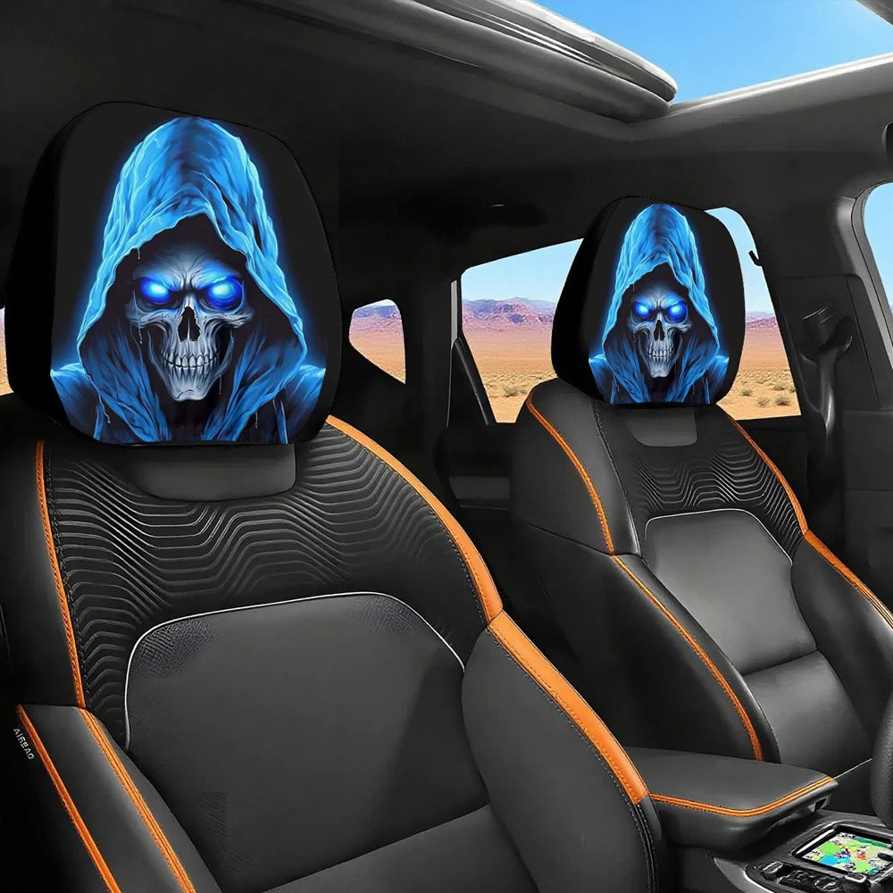 A pair of blue glowing skull headrest covers accenting the interior of a car seat.