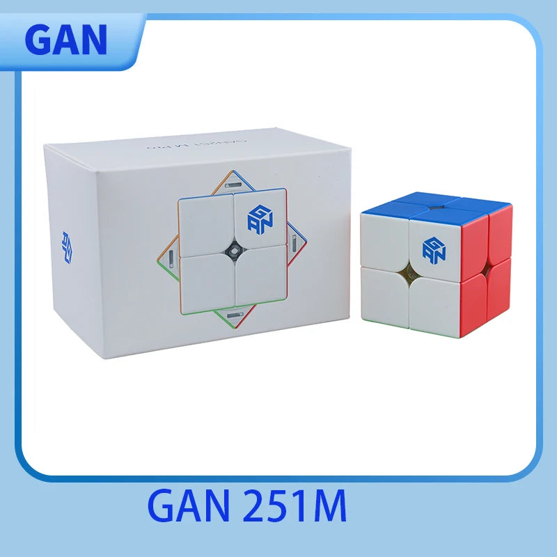 A white GAN 251M speed cube box and an assembled red and white magnetic cube.
