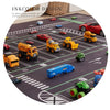 A play mat featuring various cartoon cars and vehicles for kids to use in a nursery or playroom.