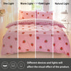 Pink strawberry print duvet cover set and pillowcases shown in dim, warm, cold, and natural light settings.