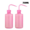 Two pink tattoo squeeze bottles with precision tips, labeled 250ml.