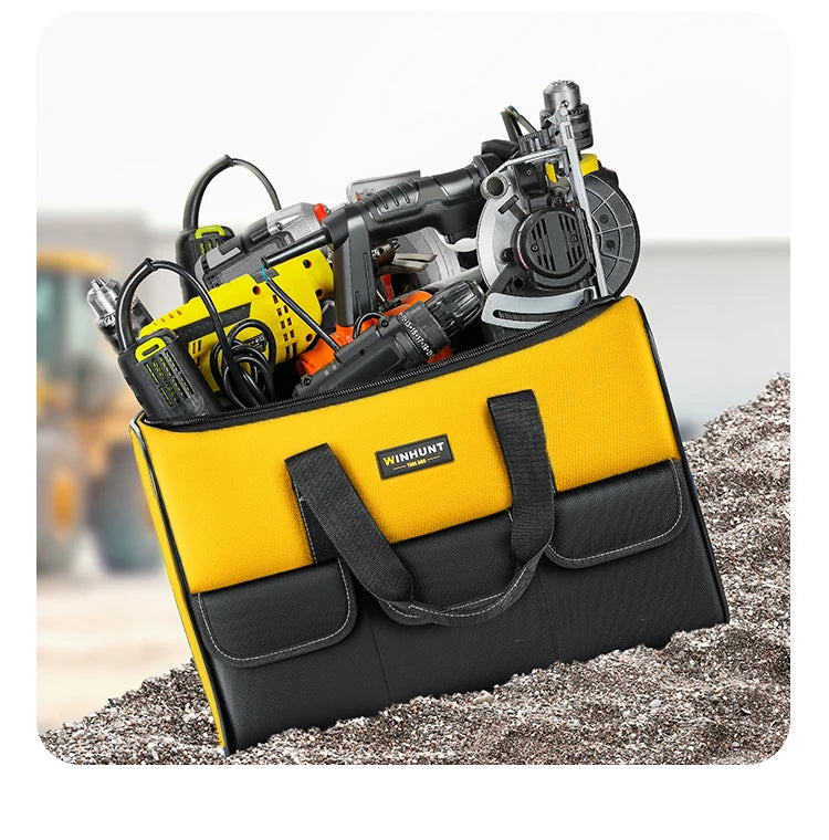 A yellow tool bag filled with various power tools and accessories, resting on a textured surface.