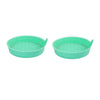 A pair of teal silicone car cup holder coasters with a textured surface and a rhinestone rim.