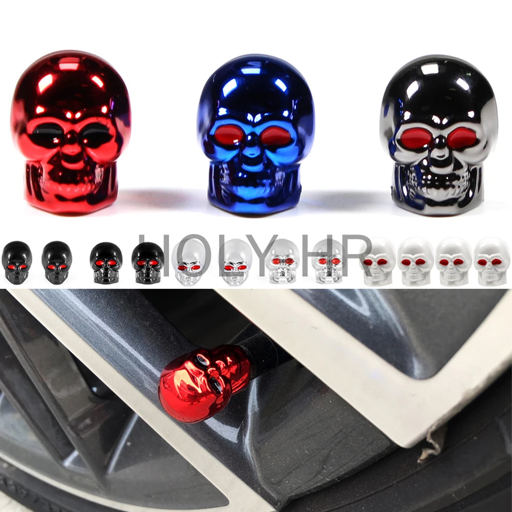 A set of four skull design tire valve stem caps in red, blue, black, and silver are displayed against a white background.