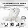 A white reversible breathable baby pillow shown with laundry instructions and care symbols.