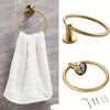 A set of four stainless steel bathroom accessories including a toilet paper holder, towel ring, and hooks.