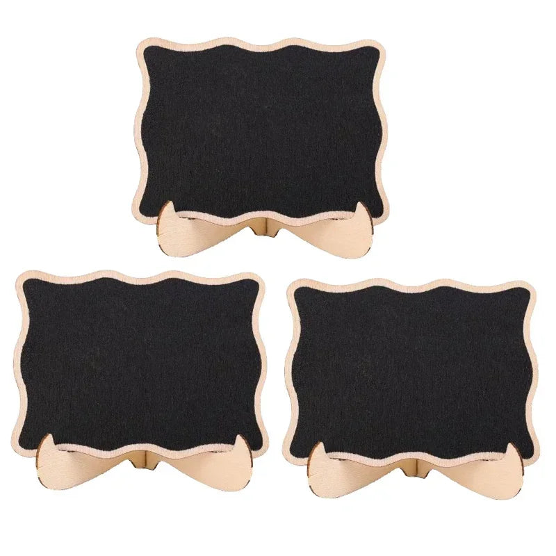 Two black felt chalkboard signs with light wood trim and curved bottom edges