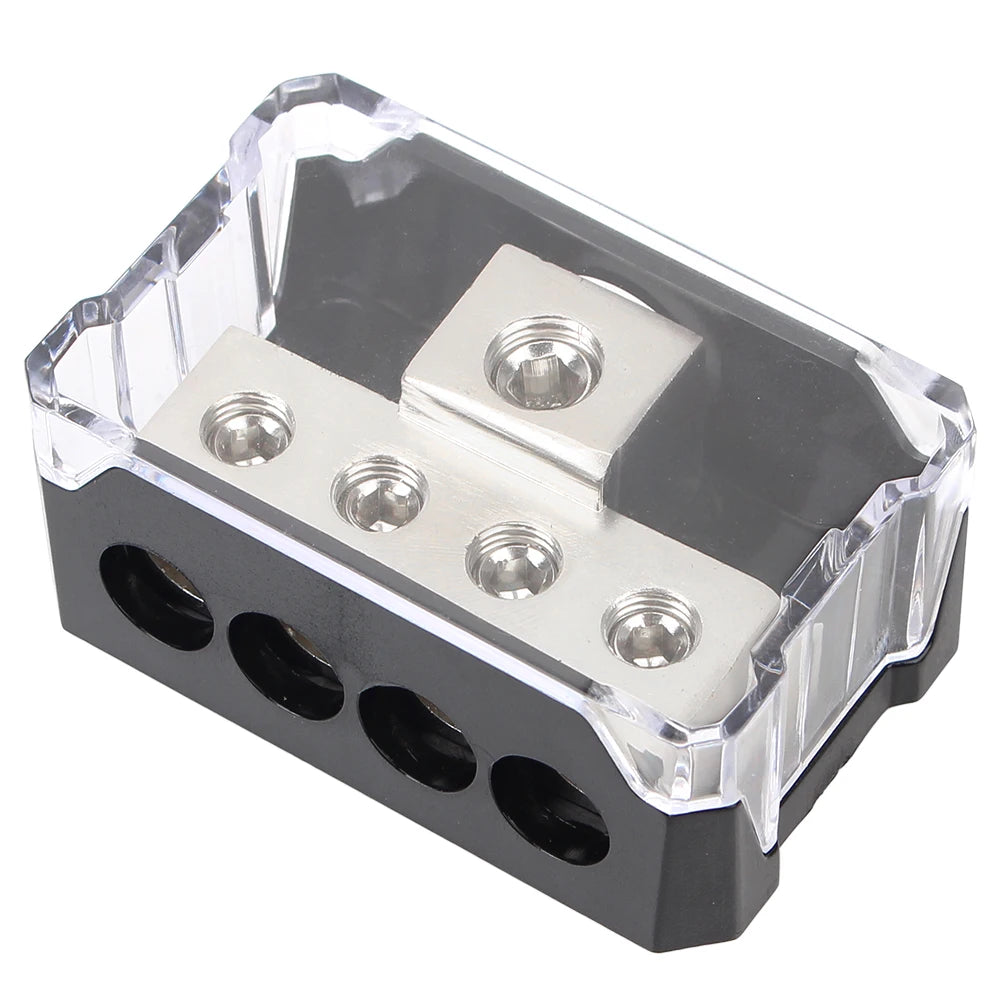 A black car audio power distribution block with clear plastic housing and four fuse holders.