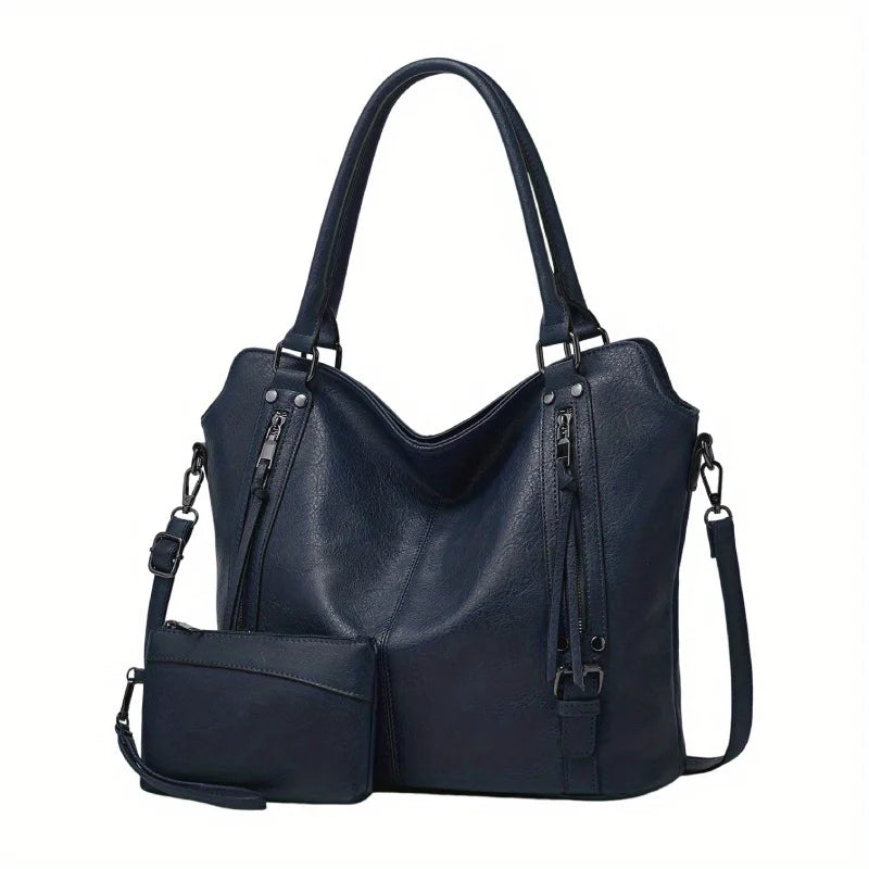 A dark navy blue PU leather tote bag with a detachable crossbody strap shown from the front.