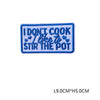 Blue embroidered patch with white text that reads I DON'T COOK I LIKE TO STIR THE POT