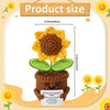 Handmade crochet plant doll with yellow flowers and green leaves, showing its size.