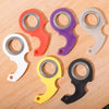 A collection of eight metal fidget spinners in various colors including red, purple, silver, white, and yellow, arranged on a