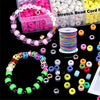 Assortment of colorful elastic bead cords and components for jewelry making including pink, white, yellow, and green beads.