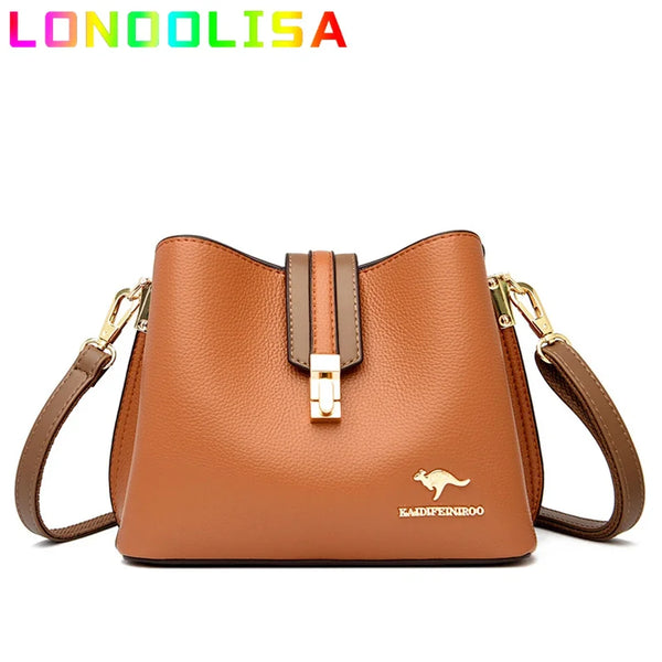 A brown leather shoulder bag with a gold-toned chain strap and a small gold silhouette emblem.